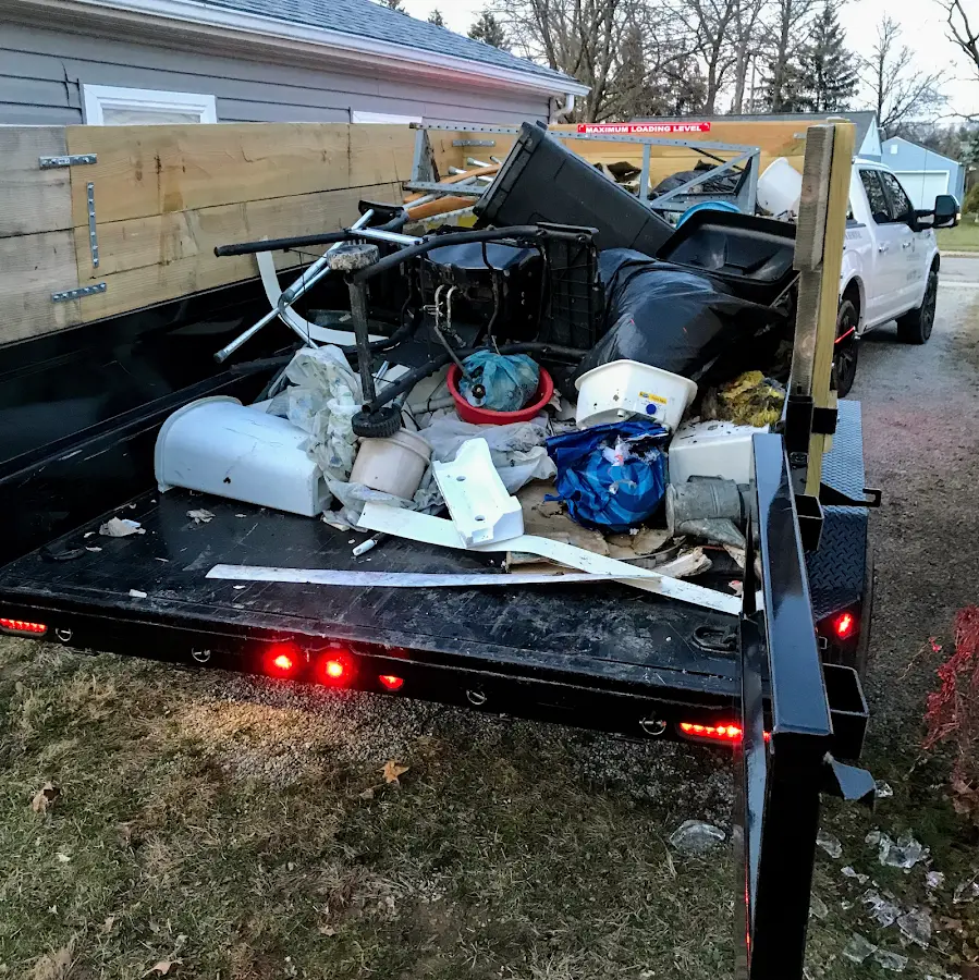 Roll-off dumpster delivered to a residential driveway in Ellery