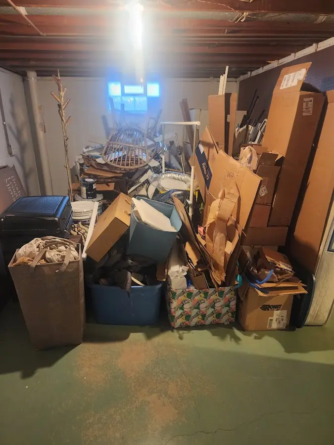 Roll-off dumpster container at job site for Construction Dumpster Rental in Ellery